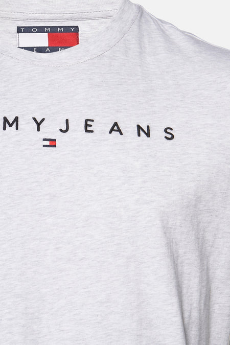 Grijs T-shirt met korte mouwen van TOMMY JEANS, met een klein logo op de borst.