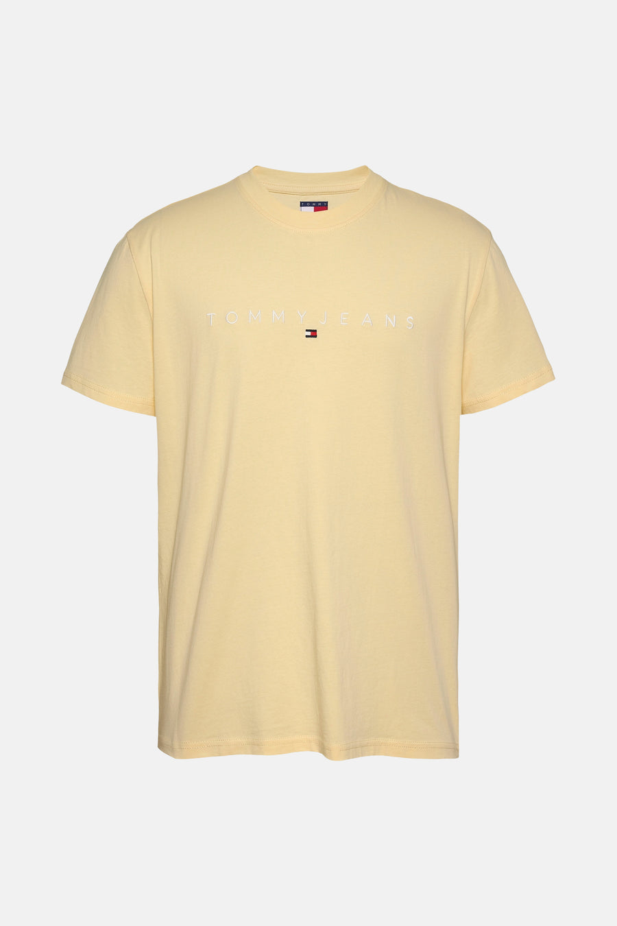Geel T-shirt met korte mouwen van TOMMY JEANS, met witte merknaam boven het kleine logo.