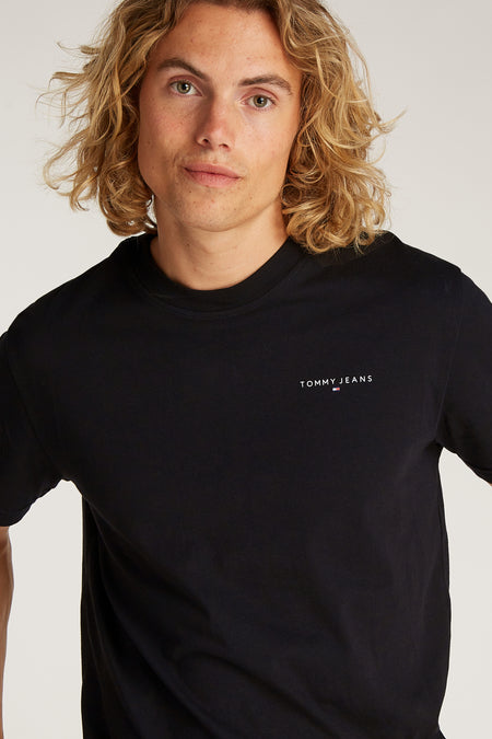 Zwart T-shirt met korte mouwen van TOMMY JEANS, effen van kleur en klassiek model.
