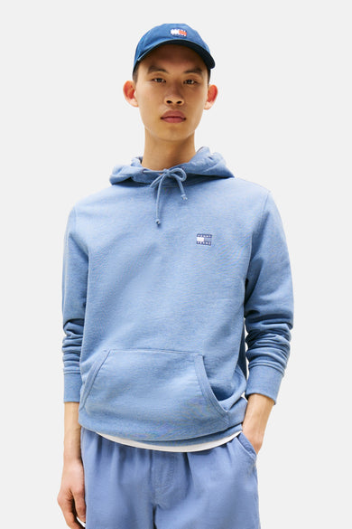 Blauwe sweater met kap van Tommy Jeans, met trekkoorden en een buidelzak.