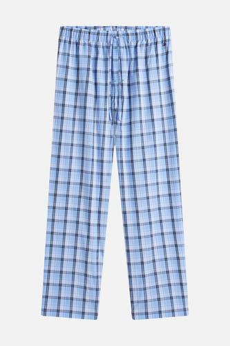Blauw geruite pyjamabroek van TOMMY JEANS, met trekkoord en elastische tailleband.
