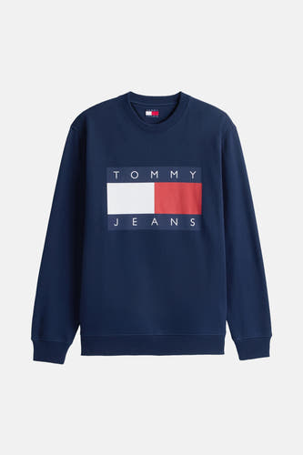 Blauwe sweater met ronde hals van TOMMY JEANS, met opvallend wit logo op de borst.