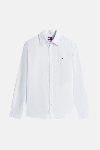 Blauw overhemd van TOMMY JEANS, met lange mouwen, knoopsluiting en het logo op de borst.