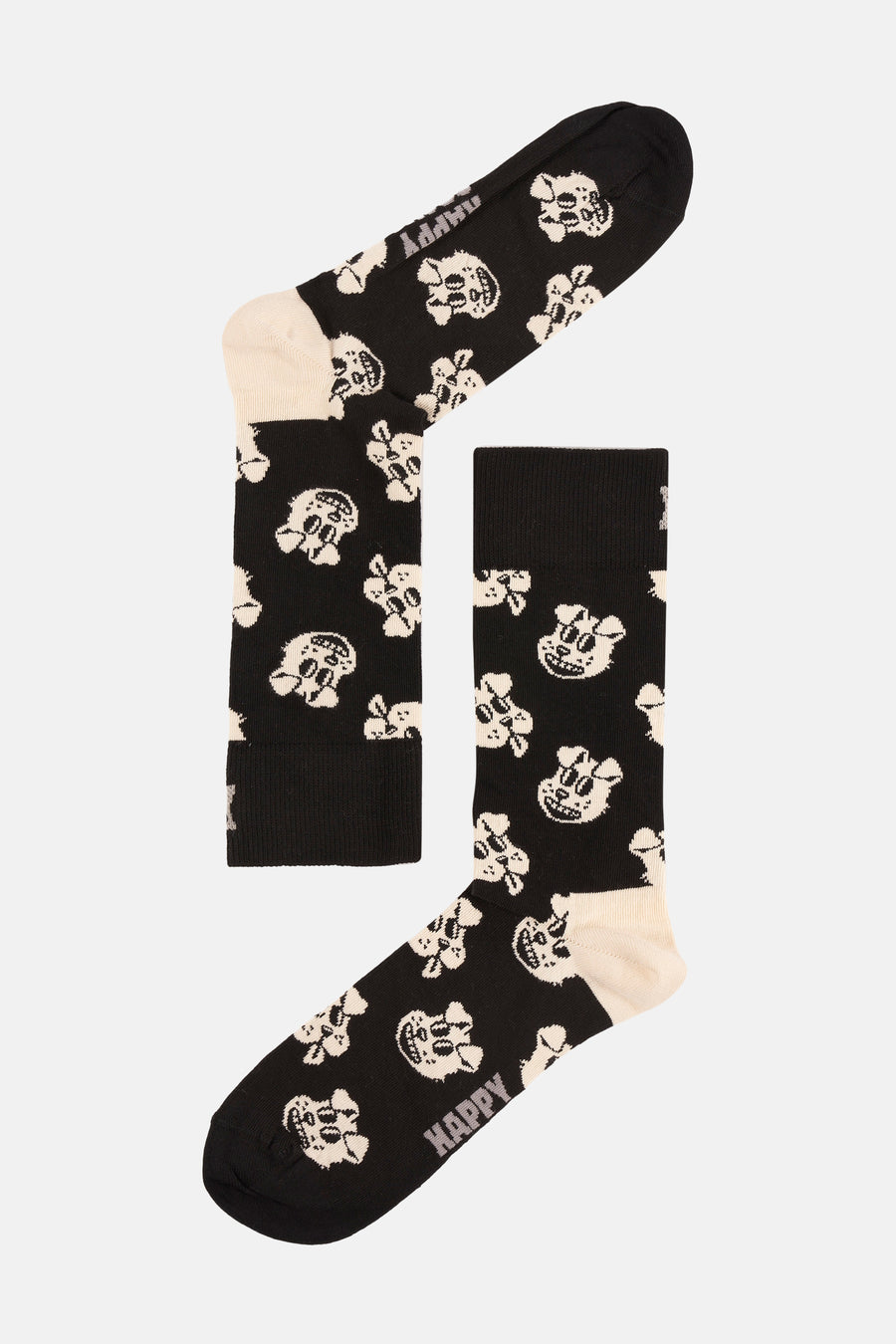 Zwarte sokken van Happy Socks®, met een patroon van witte doodshoofden.