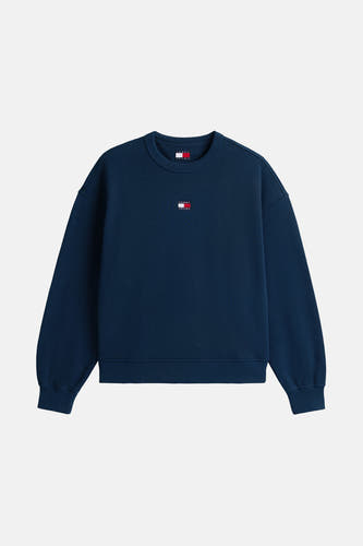 Blauwe sweater van TOMMY JEANS, met klein logo op de borst en lange mouwen.
