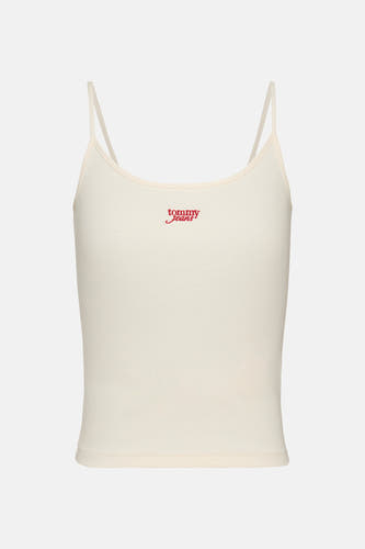 Ecrukleurige singlet van TOMMY JEANS met spaghettibandjes en een rood geborduurd logo op de borst.
