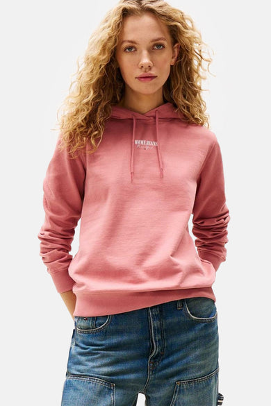 Gilet rose avec capuche de TOMMY JEANS, avec un logo sur la poitrine et des manches longues.