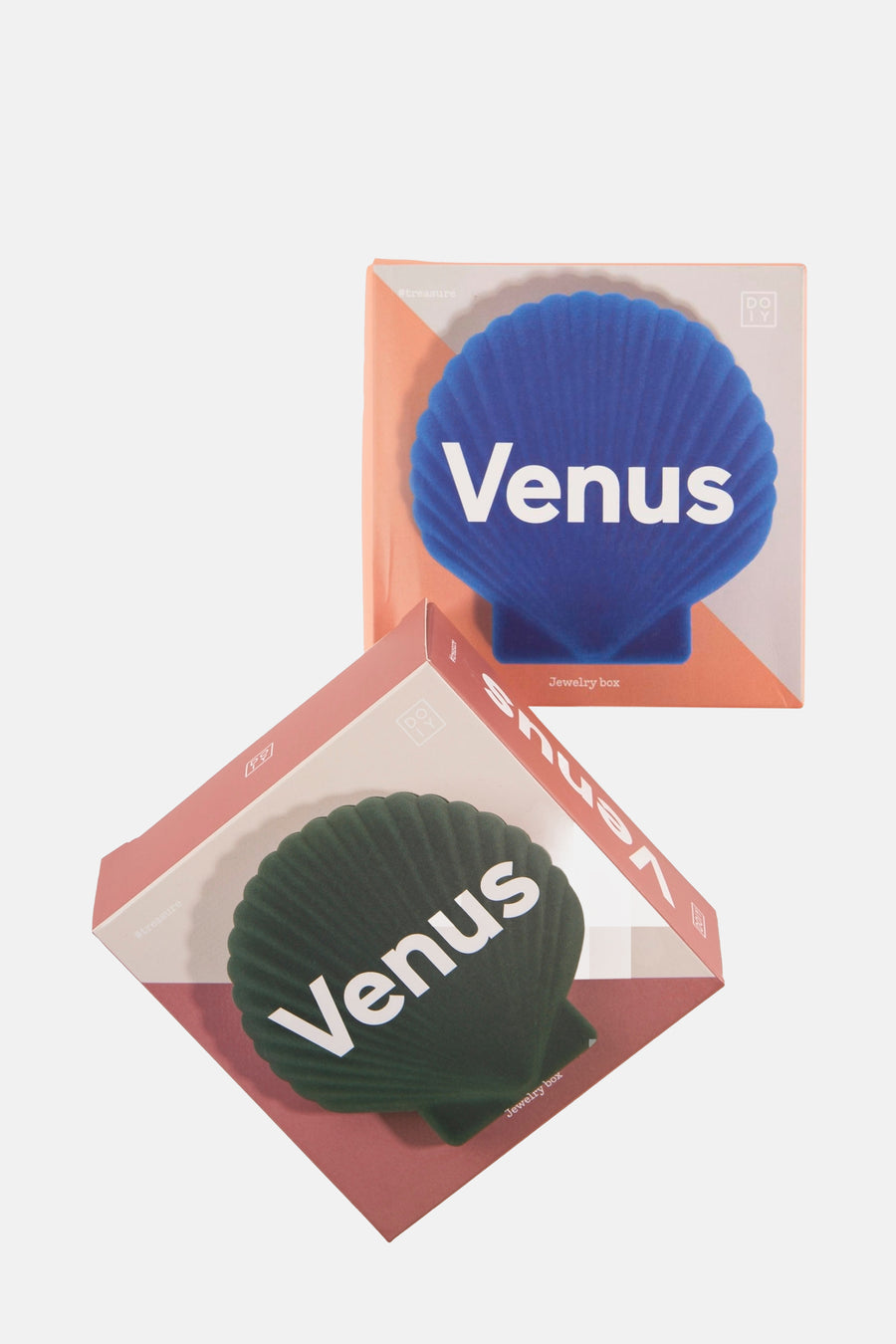 Blauwe geschenkdoos van DOIY, in de vorm van een schelp, met witte letters "Venus" erop.