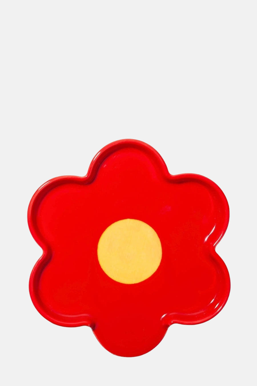 Multicolor geschenk van DOIY, met een bloemvormig ontwerp in rood met een gele cirkel in het midden.
