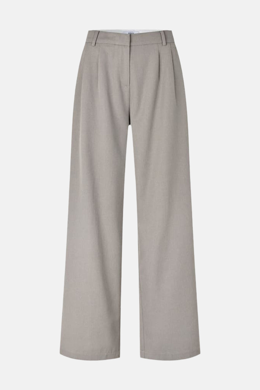 Pantalon beige d'ENVII, avec jambes larges et plis sur le devant.