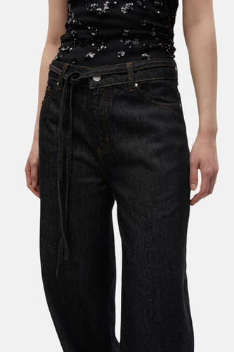 Zwarte wijde jeans van ENVII, met een koord in de taille en oranje stiksels.