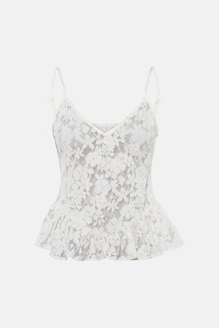 Camisole en dentelle blanche ENVII à motif floral et ourlet à volants évasé.