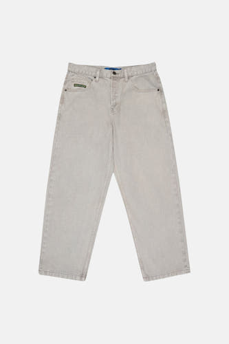 Lichte grijze denim jeans met speciale pasvorm van DC SHOES, met groen label op de rechterzak.