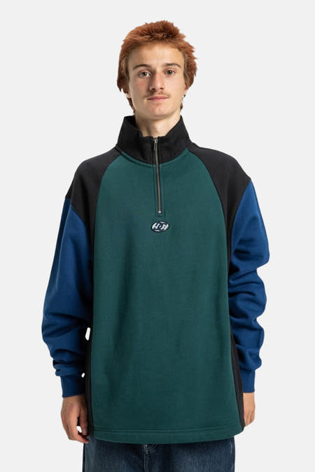 Multikleurige sweater van DC SHOES met een hoge kraag en een korte ritssluiting.