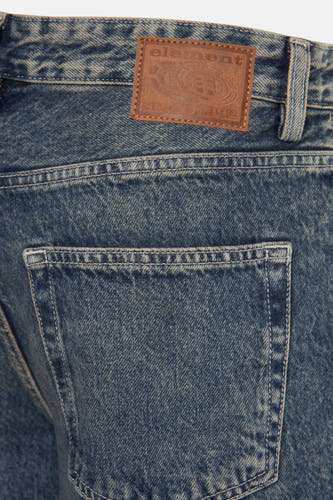 Wijde jeans van ELEMENT in blauw denim, met achterzak en merklabel op de tailleband.