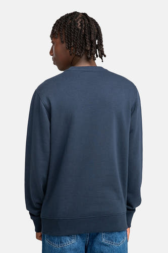 Pull-over bleu avec col rond d'ELEMENTLEMENT porté en dos avec un jeans bleu.