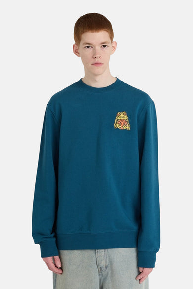 Gilet bleu d'ELEMENT avec un imprimé d'un canard tenant une balle.