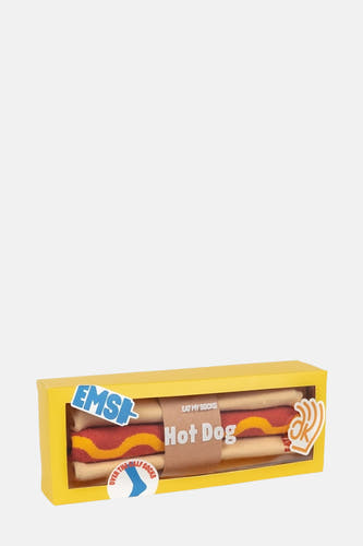 Multikleurige sokken van EAT MY SOCKS, gepresenteerd als een hotdog in een gele doos.
