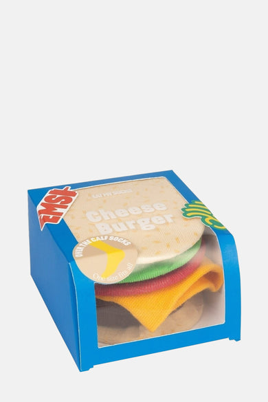 Chaussettes multicolores d'EAT MY SOCKS, dans un emballage en forme de cheeseburger.