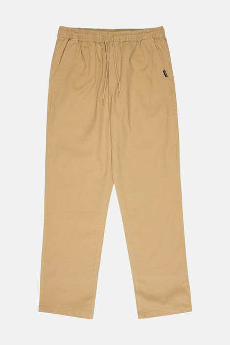 Beige broek van Quiksilver, met een elastische tailleband en een trekkoord.