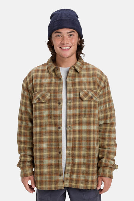 Chemise multicolore à longues manches de Quiksilver, avec un motif de fenêtre et une doublure sherpa grise.