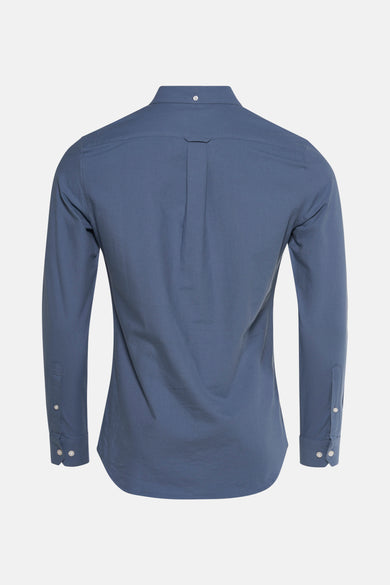 Chemise bleue à manches longues de FARAH, dos plissé et détail de nœud sur le col.