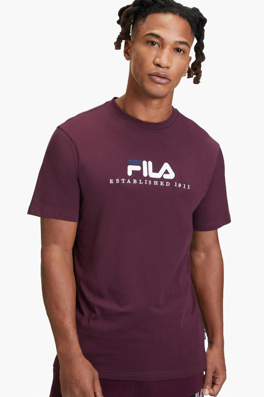 T-shirt rouge à manches courtes de FILA, couleur unie et coupe classique.