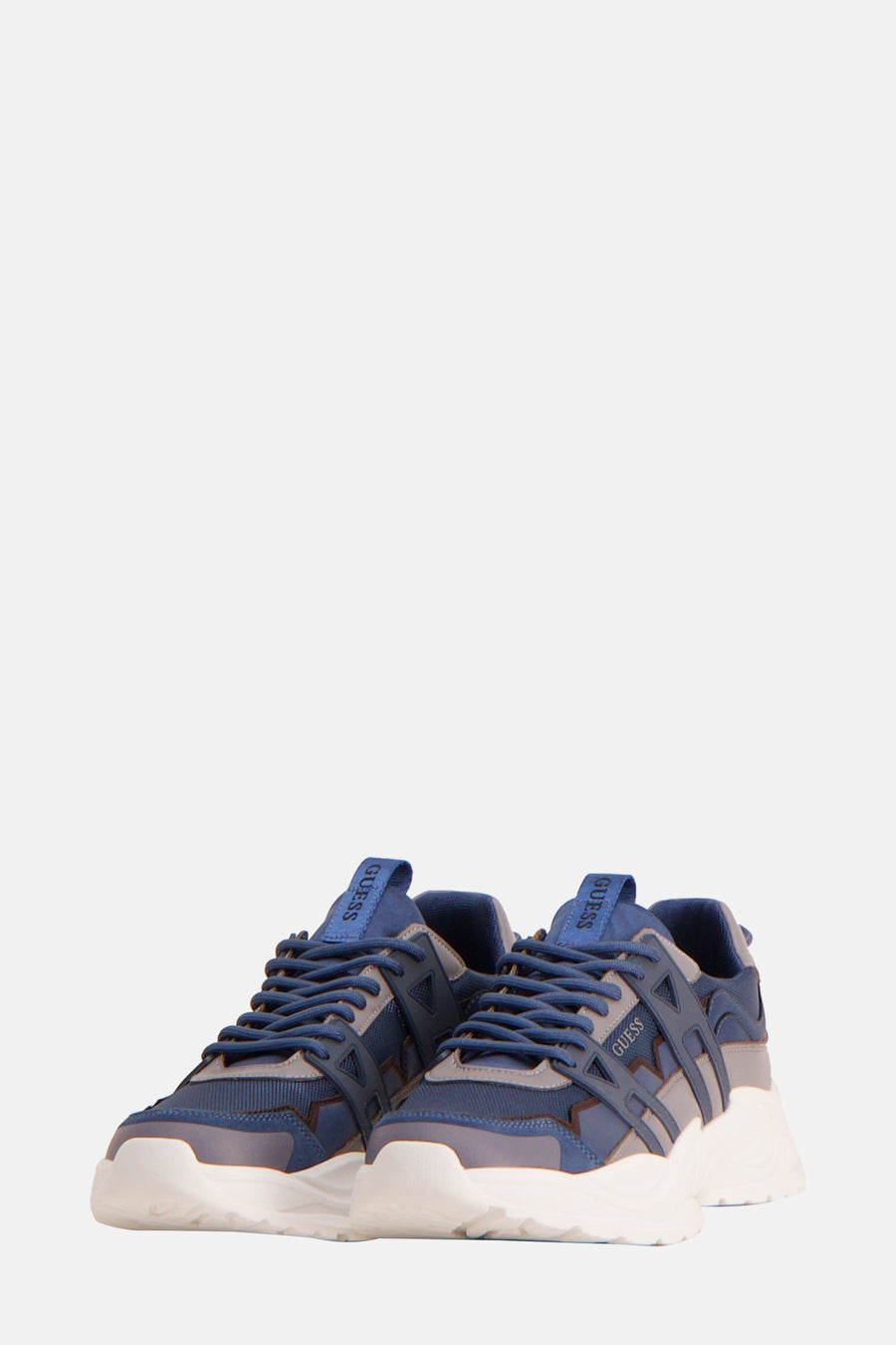 Blauwe sneakers van Guess met grijze details en een witte zool.