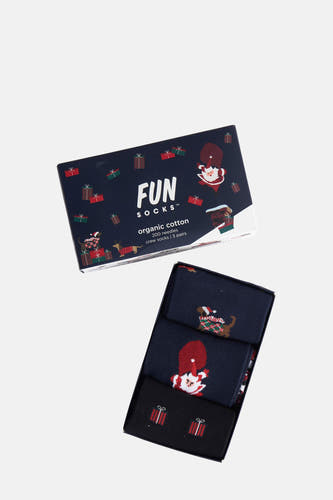 Multikleurige sokken van FunSocks, in een doos met kerstfiguren zoals een dachshund en kerstman.