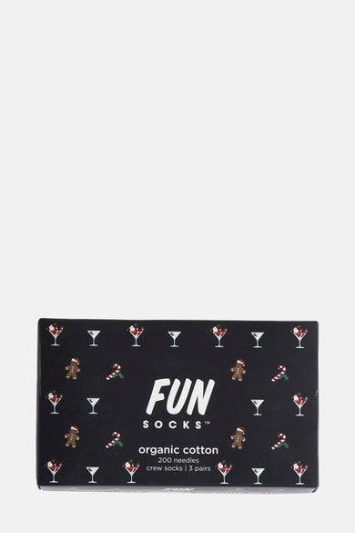 Chaussettes multicolores de FunSocks, décorées de cocktails de Noël, de bonhommes de pain d'épice et de chaussettes de sucre.