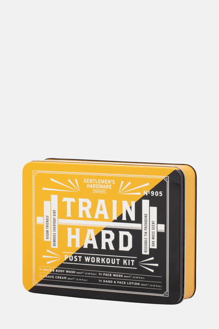 Cadeau multicolore de Gentlemen's Hardware, avec le texte "Train Hard" dans une boîte métallique rectangulaire.