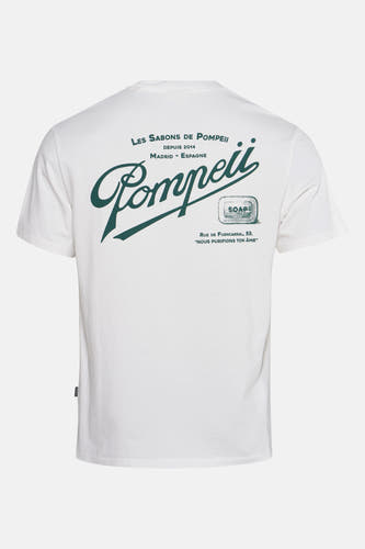 Ecru T-shirt met korte mouwen van POMPEII, met groene "Les Sabons de Pompeii" print op de achterkant.

