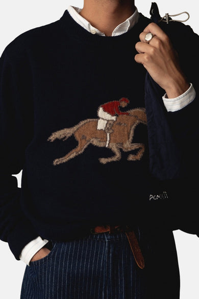 T-shirt bleu avec col rond de POMPEII, avec une image d'un cheval et d'un jockey.
