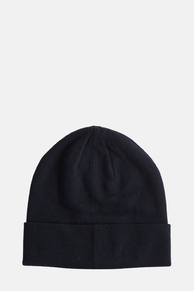 Blauwe muts van LYLE & SCOTT, effen gebreide textuur, met een omgeslagen rand.
