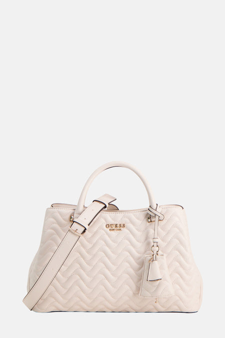 Sac à main blanc de Guess, avec un motif brodé zigzag et une bandoulière amovible.