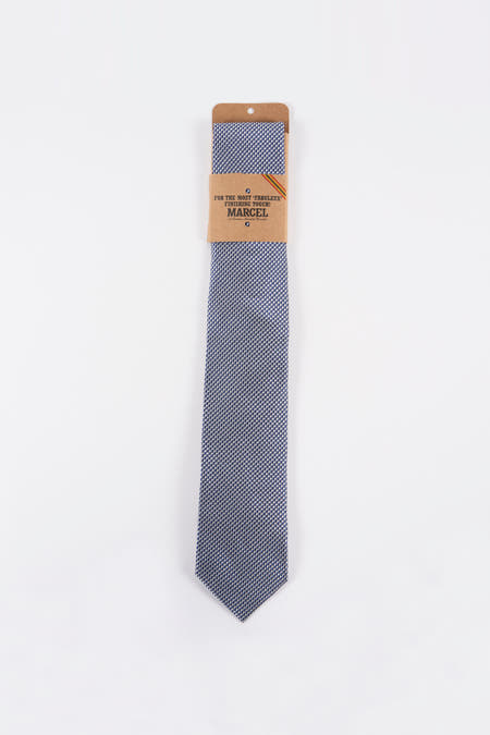 Blauwe das van Le Fabuleux Marcel de Bruxelles, met een fijn geometrisch motief.
