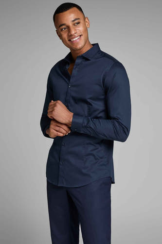 Blauw overhemd met lange mouwen van PREMIUM by JACK & JONES, met geknoopte manchetten en zichtbare knoopsluiting.