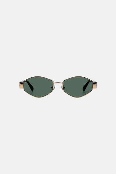Gouden zonnebril van KOMONO, met groen getinte glazen en een dun metalen montuur.
