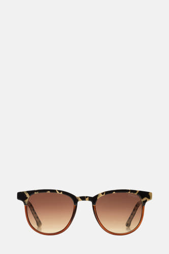 Lunettes brunes KOMONO, avec imprimé léopard sur le cadre et une teinte brune dans les verres.