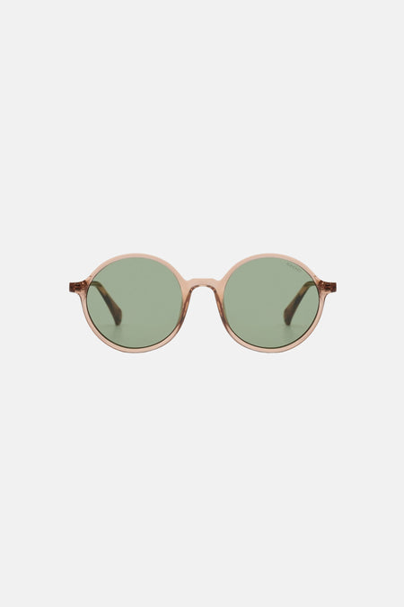 Lunettes de soleil marron de KOMONO, avec verres ronds et monture marron transparente.