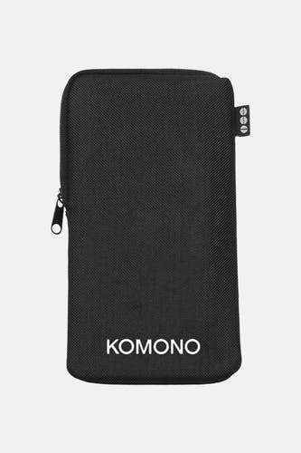 Bruine zonnebril van KOMONO, met een zwart etui met ritssluiting.