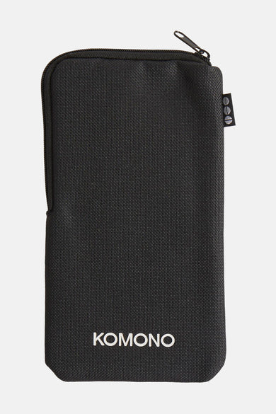 Bracelet multicolore KOMONO, avec une texture lisse et un fermoir à l'extrémité supérieure.