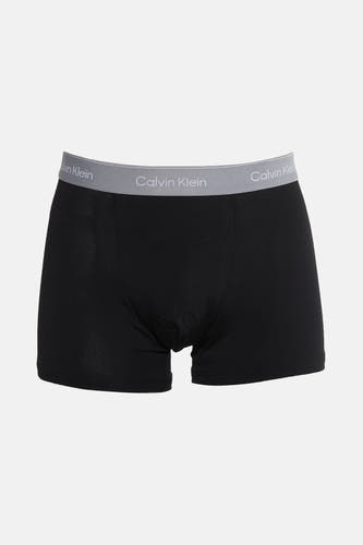Zwarte slip van Calvin Klein, met een grijze elastische band met logo.
