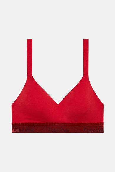 Soutien-gorge rouge Calvin Klein, avec une bande élastique à logo autour.