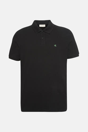 Zwarte polo met korte mouwen van Calvin Klein, met groen logo op de borst.
