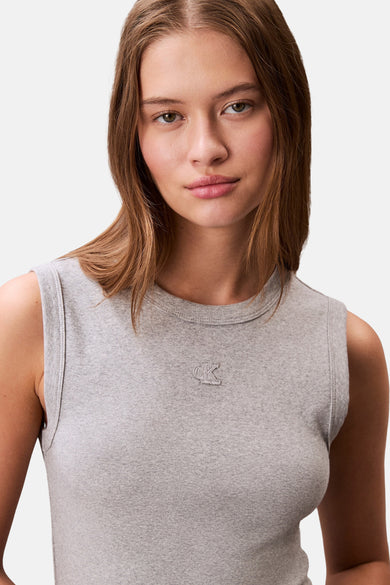 Grijs kleedje zonder mouwen van Calvin Klein, met logo op de borst en effen patroon.