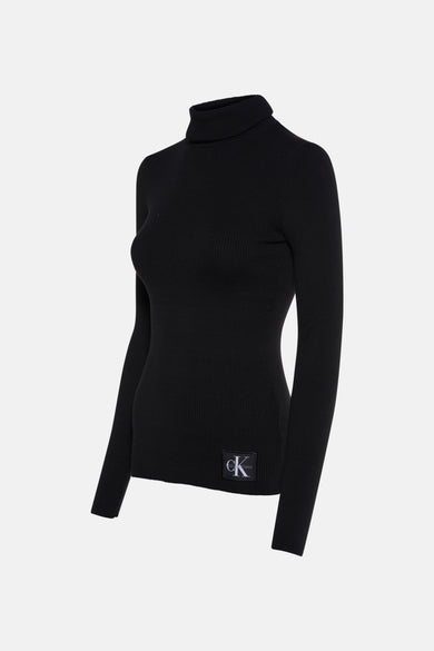 Sweat-shirt noir Calvin Klein, avec structure en côtes et un patch logo sur l'ourlet.