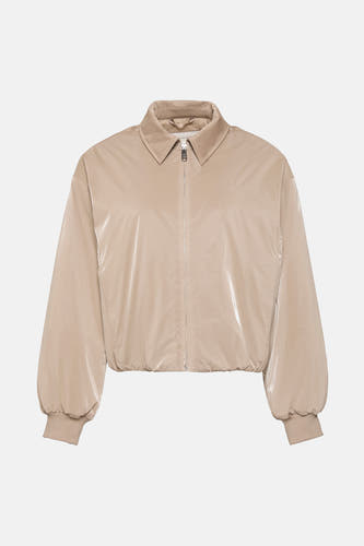 Beige jack van Calvin Klein, met lange ballonmouwen en een kraag.