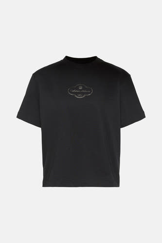 T-shirt noir à manches courtes de Calvin Klein avec un logo sur la poitrine.