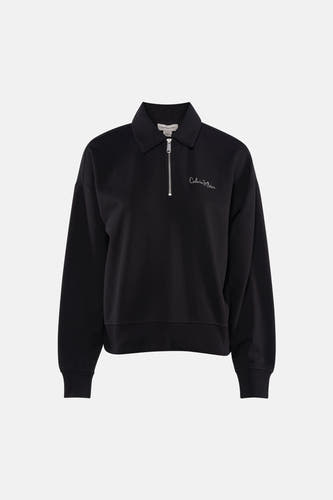 Gilet noir de Calvin Klein avec fermeture éclair et logo Calvin Klein sur l'avant.